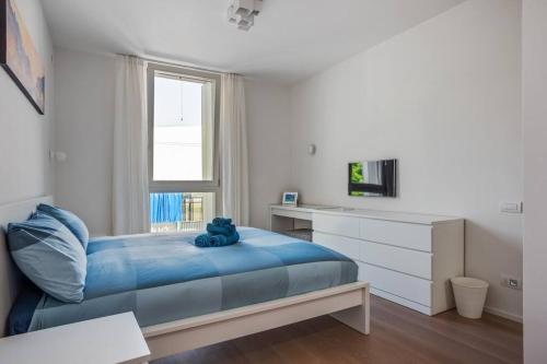 Katil atau katil-katil dalam bilik di Easylife - Modern and Spacious apt in Fiera City Life