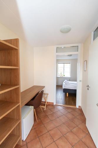 Ένα ή περισσότερα κρεβάτια σε δωμάτιο στο Foldens Hotel