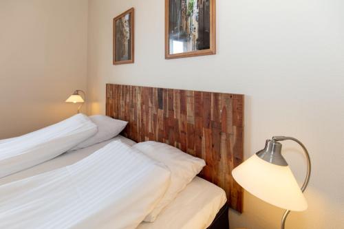 Ένα ή περισσότερα κρεβάτια σε δωμάτιο στο Foldens Hotel