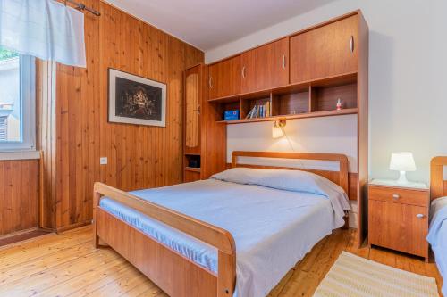 Postel nebo postele na pokoji v ubytování Soba Cres