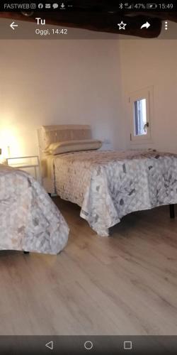 Postel nebo postele na pokoji v ubytování Casa Marina