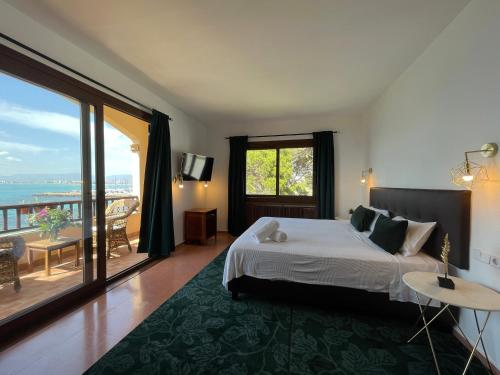 Ένα ή περισσότερα κρεβάτια σε δωμάτιο στο Villa Kamok