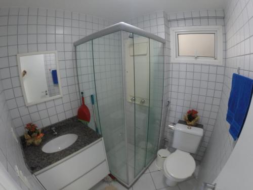 a bathroom with a shower and a toilet and a sink at Marina Bezerril - Pontamares 903 - O melhor de Natal in Natal
