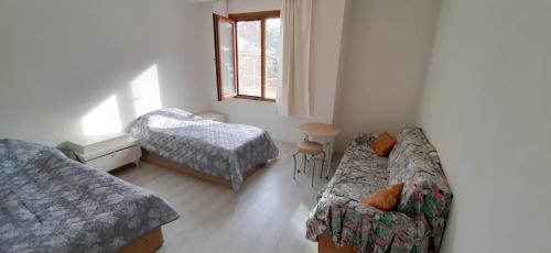 Postel nebo postele na pokoji v ubytování Hayrat black sea aparts