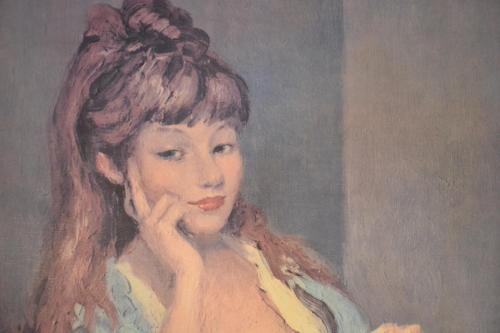 a painting of a woman with red lipstick at Copper Queen Hotel in Bisbee