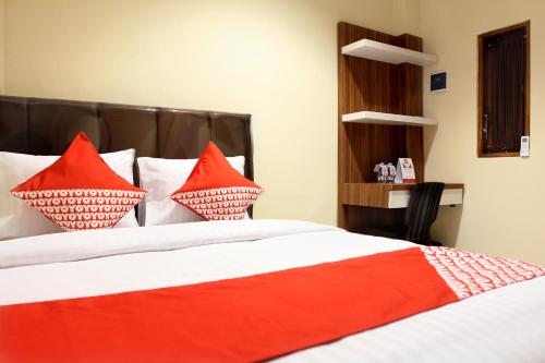 Кровать или кровати в номере OYO 121 Rumah Ayub Syariah