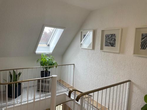 a staircase in a house with a skylight at Ferienhaus Mücheln in Mücheln