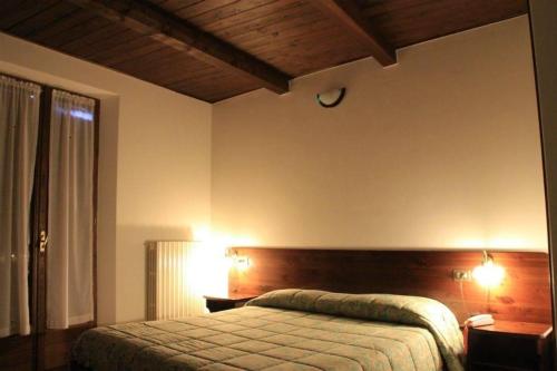 Ένα ή περισσότερα κρεβάτια σε δωμάτιο στο Guerrin Meschino