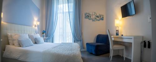 Ένα ή περισσότερα κρεβάτια σε δωμάτιο στο Sotto le Stelle ai Decumani