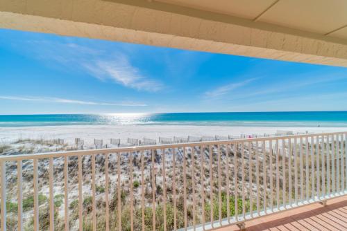 a balcony with a view of the beach at Endless Waves -208 ES Condo in Santa Rosa Beach