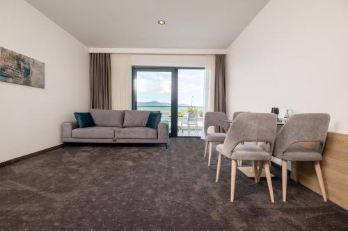 a living room with a couch and chairs and a table at Marea Hotel & Spa in Neum