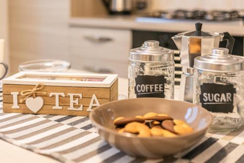 a bowl of cookies on a table in a kitchen at La Casina di Nello in Montepulciano