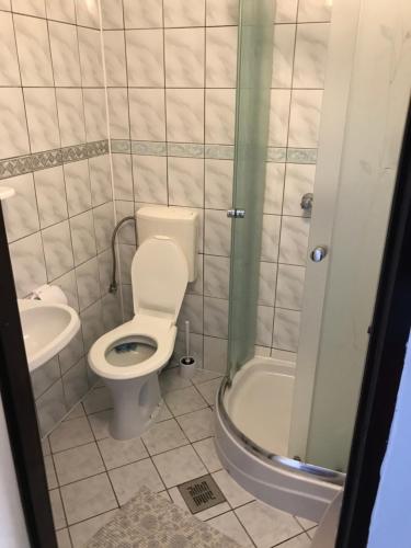 Ένα μπάνιο στο Pokoje I Apartamenty Polna 19