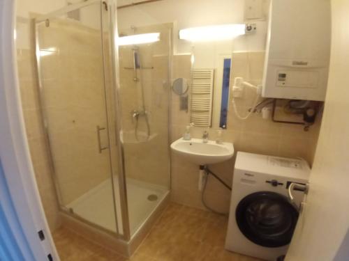 Kúpeľňa v ubytovaní Deák apartmanok