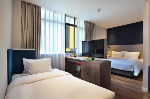 Letto o letti in una camera di Holiday Inn Express Guilin City Center by IHG