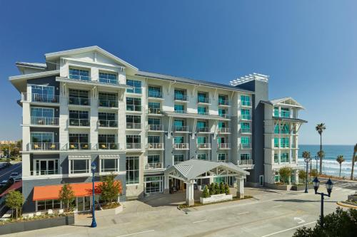a large hotel with the ocean in the background at The Seabird Ocean Resort & Spa, Part of Destination Hotel by Hyatt in Oceanside