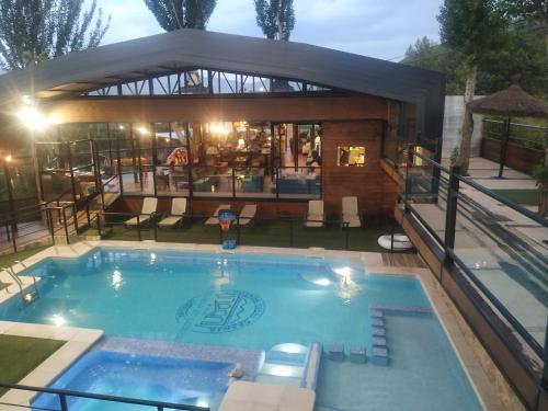The swimming pool at or close to Posada Rural SPA Granja LA TEJERA de Lozoya