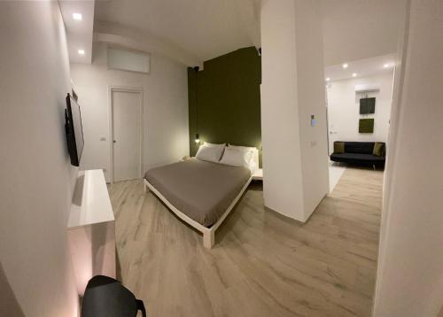 Ένα ή περισσότερα κρεβάτια σε δωμάτιο στο HOME 3 BED Aparthotel