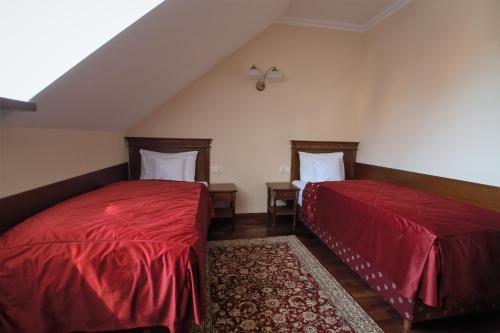 Ένα ή περισσότερα κρεβάτια σε δωμάτιο στο Apartamenty Ucho Igielne