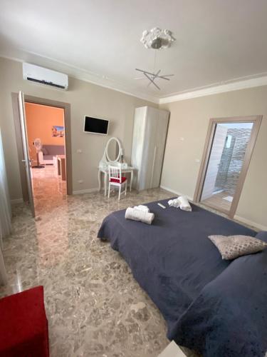 Postel nebo postele na pokoji v ubytování B&B Amores