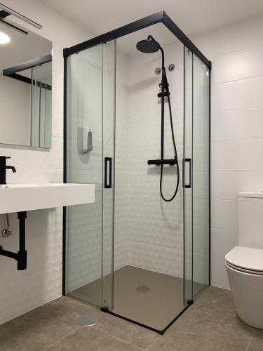 Ένα μπάνιο στο Hostal Comfort Suites