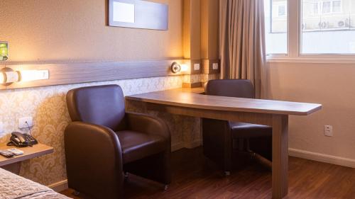 Χώρος καθιστικού στο Hotel 10 Palmas