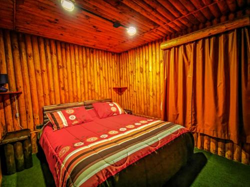 Cama o camas de una habitación en Salto del Indio - Cabañas Lemunantu