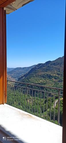 a balcony with a view of a mountain at B&B Serena in Longi
