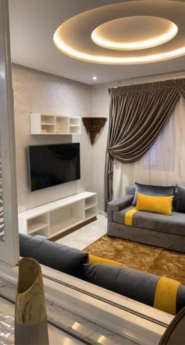 Giường trong phòng chung tại Rue Russie Appartement