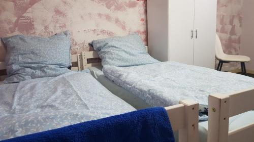 Ліжко або ліжка в номері Monteurzimmer mit Gemeinschaftsbad in Brebach