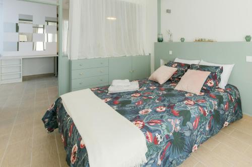 Postel nebo postele na pokoji v ubytování My Cosy Place Rabat - Appartements Argane Hay Riad