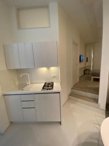 Η κουζίνα ή μικρή κουζίνα στο HOME 3 BED Aparthotel