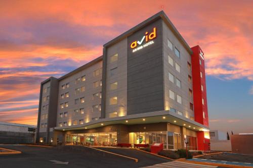 a hotel with a sign on the side of it at avid hotel - Fresnillo by IHG in Fresnillo de González Echeverría
