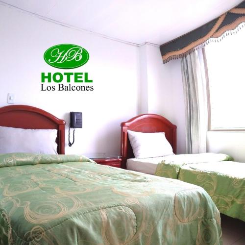 Postel nebo postele na pokoji v ubytování HOTEL LOS BALCONES