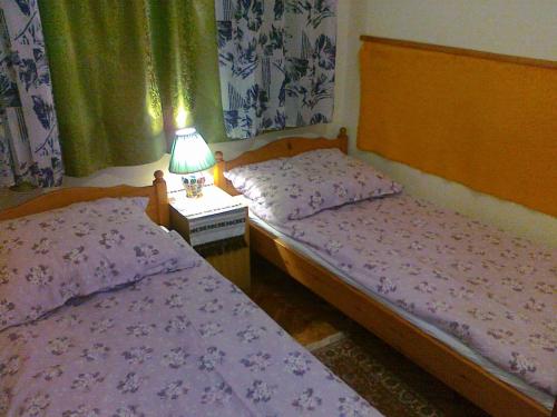Giường trong phòng chung tại Holiday home in Balatonfenyves 18465