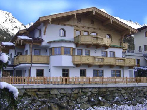 a large building with balconies on the side of it at Apartment Zell am Ziller 2 in Zell am Ziller