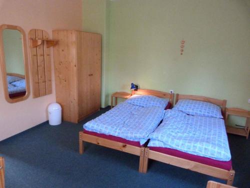 Postel nebo postele na pokoji v ubytování Holiday home Vrchlabi/Riesengebirge 2190