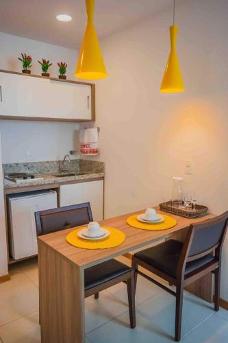 Kuchyň nebo kuchyňský kout v ubytování Flat Completo para uma estadia perfeita NOTA FISCAL
