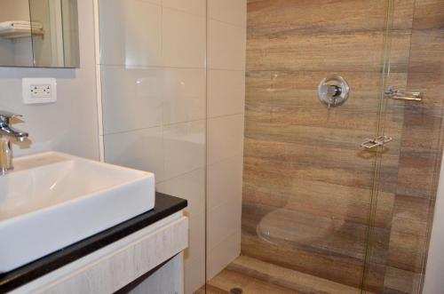 Ett badrum på Suites Home 118 By SHG