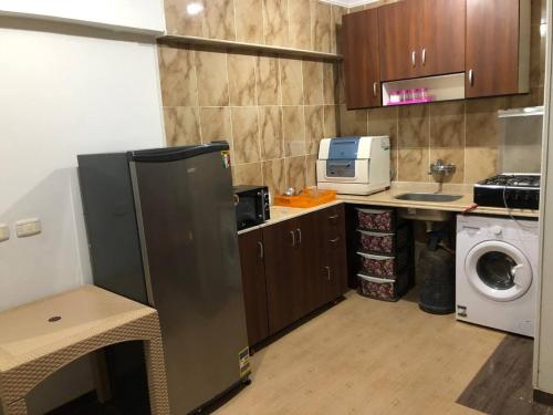 A kitchen or kitchenette at Amazing Chalet at Bluebay Asian Resort Pool View - Families Only