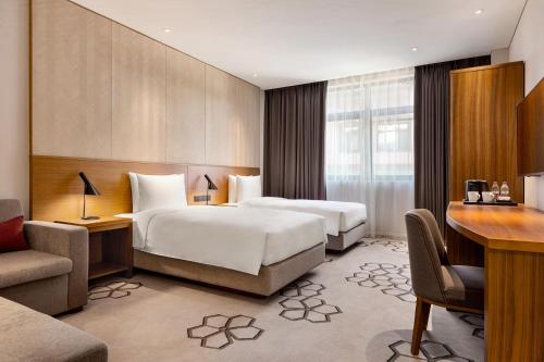 Ένα ή περισσότερα κρεβάτια σε δωμάτιο στο Hyatt Place Chongli