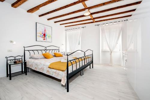 Krevet ili kreveti u jedinici u okviru objekta Apartment De Amicis