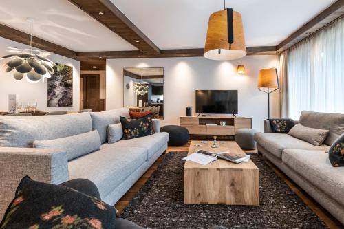 Χώρος καθιστικού στο Kinabalu by Alpine Resorts