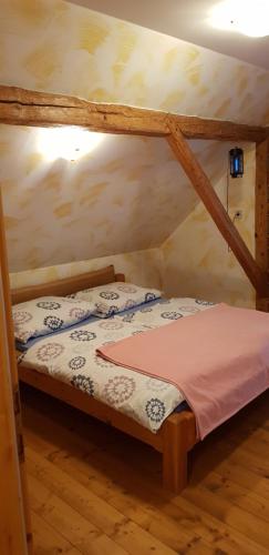 Ένα ή περισσότερα κρεβάτια σε δωμάτιο στο Apartments Za Grapo