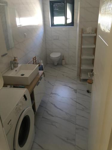 Koupelna v ubytování Apartmani Zlata