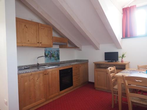 Kuchyň nebo kuchyňský kout v ubytování Hotel B&B Francolini