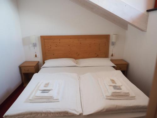 Hotel B&B Francoliniにあるベッド