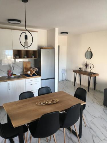 Kuchyň nebo kuchyňský kout v ubytování Apartmani Zlata