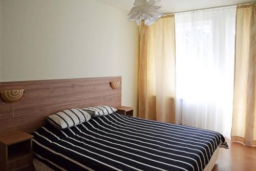 Ένα ή περισσότερα κρεβάτια σε δωμάτιο στο Cozy One Bedroom Apartment in Iglika Complex