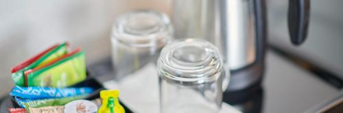 a pair of glasses sitting on top of a counter at Hotel Hottingen in Zürich